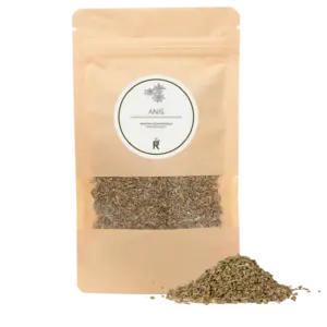 Das Bild zeigt einen Haufen Anis vor einer Verpackung.