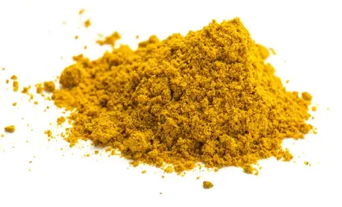 Das Bild zeigt einen Haufen gemahlenes Currypulver.